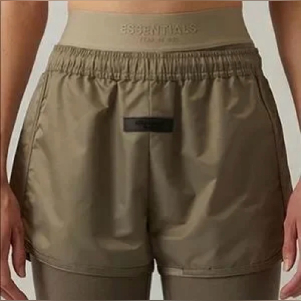 NWT Essentials Fear Of God Women's
Desert Taupe Running Shorts, MED